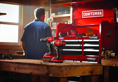 Craftsman power tools and tool chest with man facing away